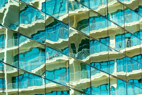 Reflection of architecture in large mirrored windows