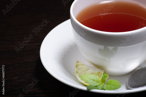 Closeup of cup of lemon tea