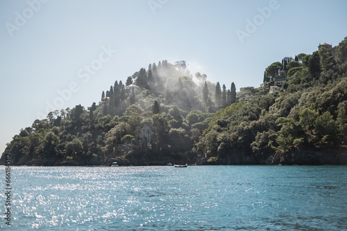 Famous place on the Italian Riviera coast - views of Portofino from the sea and cliffs