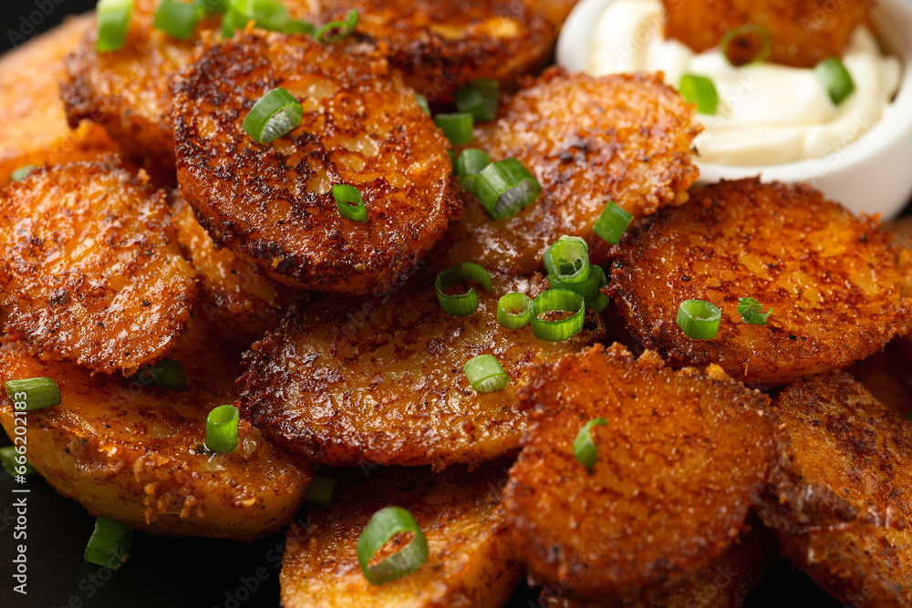 Parmesan crusted baby new potatoes served with mayonnaise dip