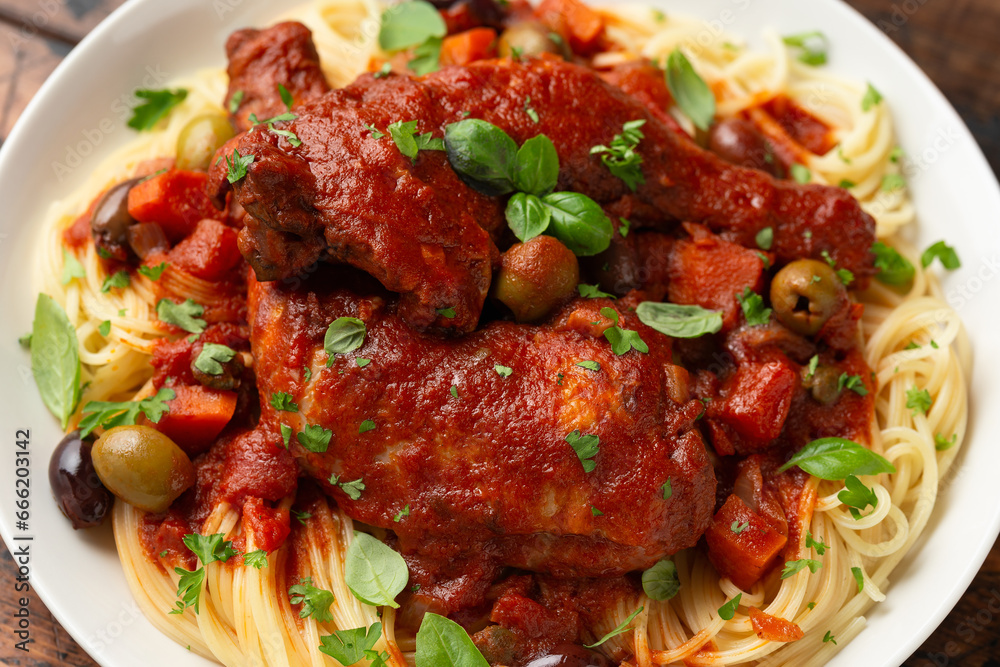 Cacciatore Chicken with spaghetti, vegetables, olives and tomatoes Cacciatore Chicken with spaghetti, vegetables, olives and tomatoes