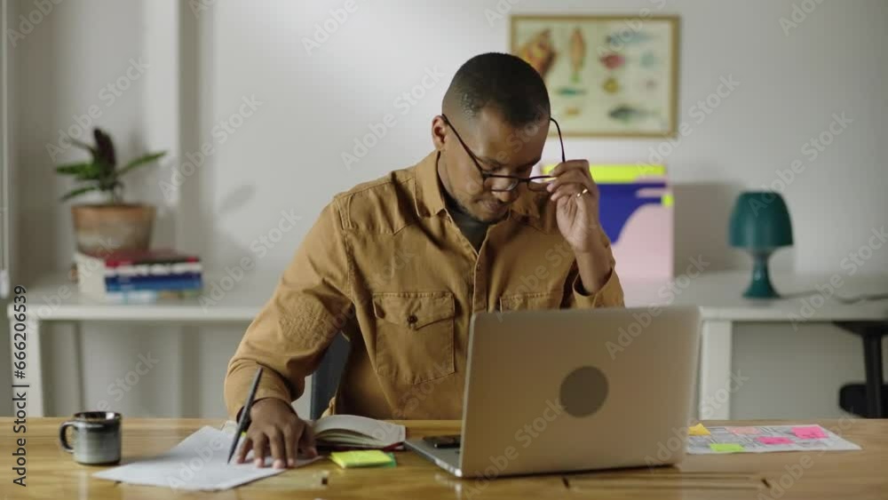 Adult black angry tired businessman feel stress and punches the table. Work burnout concept.
Adult black angry tired businessman feel stress and punches the table. Work burnout concept.