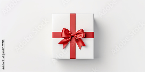 white gift box with ribbon © DenisIgnatenco
