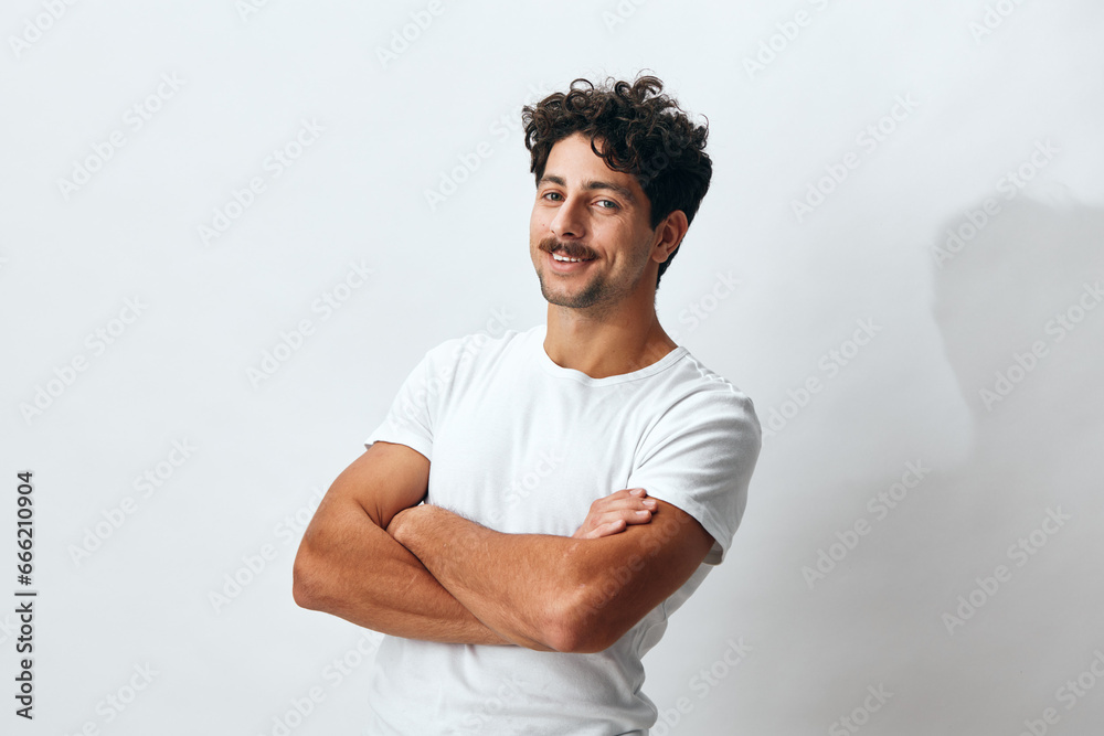 Man lifestyle portrait white casual isolated confident hipster smile studio fashion t-shirt background face