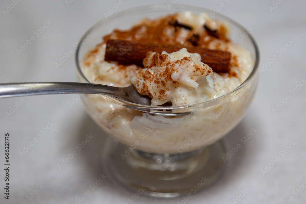 Traditional rice pudding. Sweet dish made by cooking rice in milk and sugar, some recipes include cinnamon, vanilla or other ingredients, it is a very easy dessert to make . Traditional rice pudding. Sweet dish made by cooking rice in milk and sugar, some recipes include cinnamon, vanilla or other ingredients, it is a very easy dessert to make .