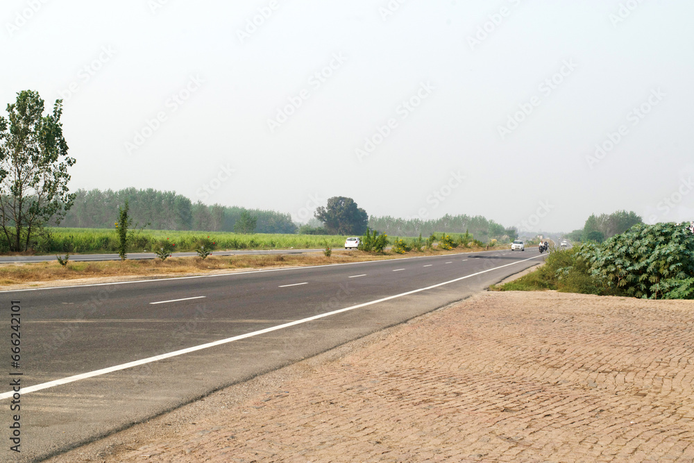 Clean and empty highway road at uttar pradesh