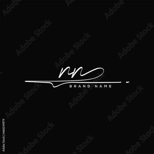 N letter beauty handwriting vector logo.  photo