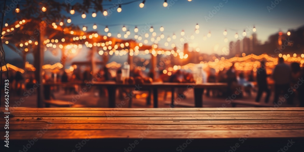 An eclectic wooden table at a vibrant music festival, with the dynamic crowd of festival-goers and the vibrant stage lights creating an electric festival atmosphere.