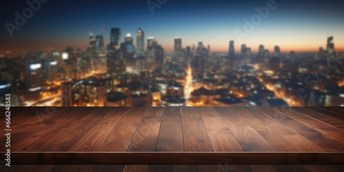 A tranquil dark wood countertop softly melding into a cityscape backdrop filled with skyscrapers and urban illumination.