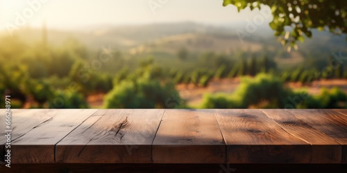 A dark wood countertop with a sophisticated touch, gracefully merging with the hazy vineyard scenery, offering a serene blend with the softly blurred surroundings.