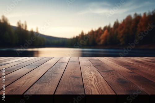 A dark wood tabletop gently dissolving into the serene lakeside scene  offering a tranquil and inviting setting.