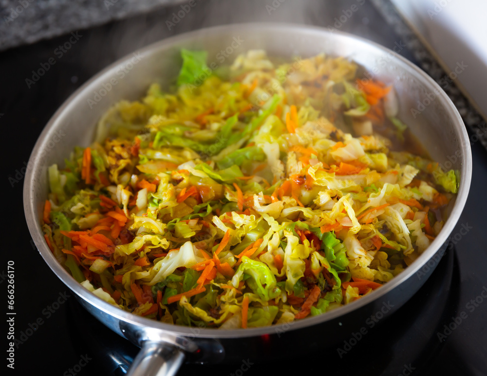 Cooking of stewed cabbage process, preparation of healthy dinner