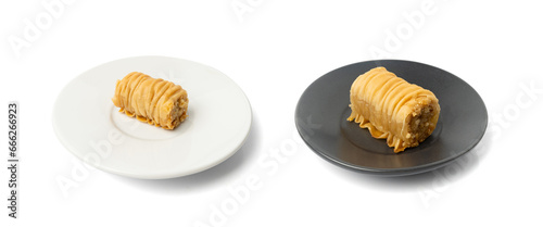 Rolled Baklava Isolated, Ramadan Dessert Roll on Restaurant Plate, Eastern Sweet Pastries photo