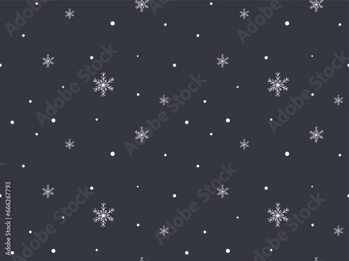 Winter snow seamless pattern. Hand drawn white snowflakes on gray. Seasonal holidays background. Cold weather