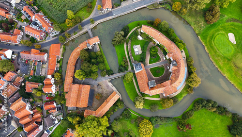 Aerial drone view water castle Wasserschloss Burgsteinfurt Steinfurt, North Rhine-Westphalia, Germany. photo