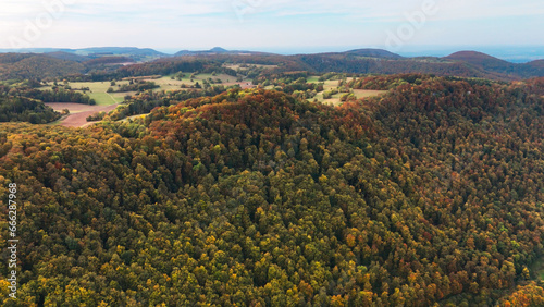 Aerial drone view of autumn landscape of valley between mountains autumn forest Baden-Wurttemberg, Germany.