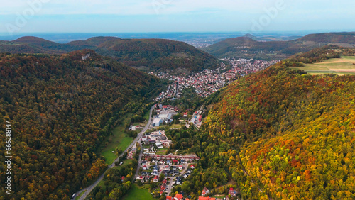Aerial drone view of autumn landscape of valley between mountains autumn forest Baden-Wurttemberg, Germany.