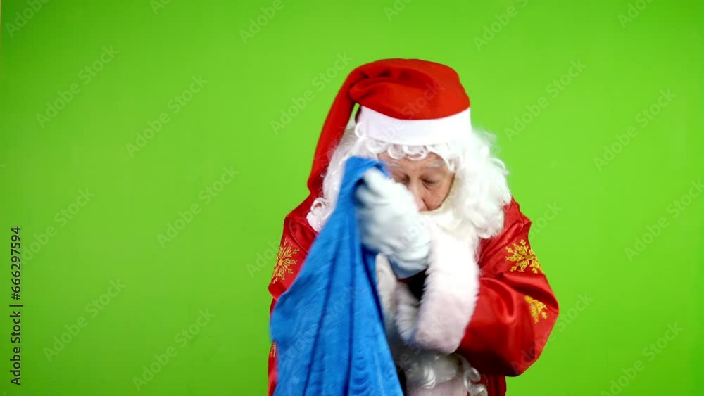 Embarrassed Santa Claus shows empty bag and is very upset about loss of gifts. Embarrassed Santa Claus shows empty bag and is very upset about loss of gifts.