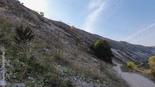 Idyllic scene with view to the karst limestone hills at Orheiul Vechi, old Orhei complex, near Trebujeni village, Moldova. Autumn season nature landscape photo