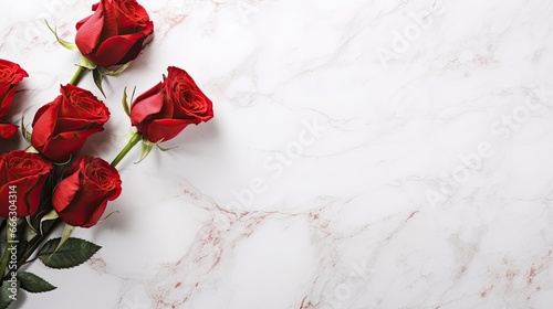 Beautiful red roses on white marble table