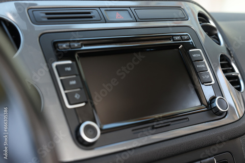 Closeup view of dashboard with vehicle audio in car © New Africa
