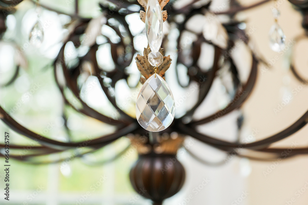 chandelier with intricate crystal details, casting elegant light patterns in a luxurious setting, epitomizing opulence, grandeur, and sophistication