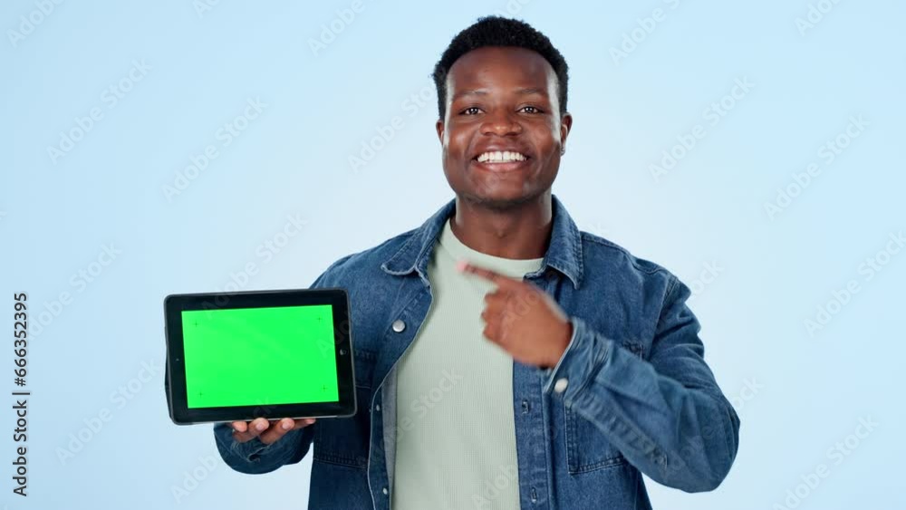 Black man, tablet green screen and presentation mockup of website, information or e learning sign up in studio. Face of african student pointing you, digital education or marketing on blue background