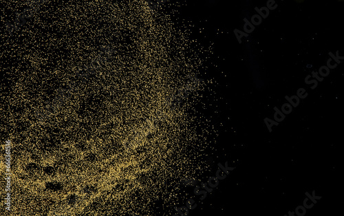 Small size yellow Sand flying explosion  gold cheese sands grain wave explode. Abstract cloud fly. Yellow colored sand splash throwing in Air. black background Isolated high speed shutter  throwing