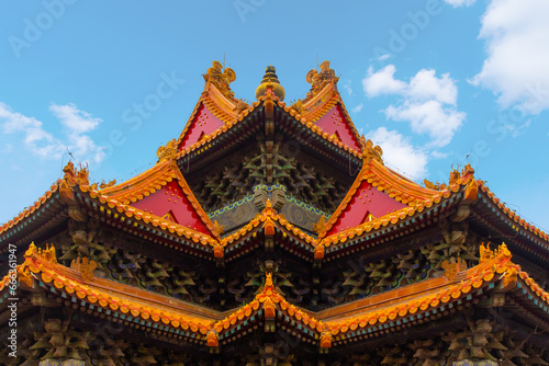 View of palace in Forbidden city against blue sky in Beijing
