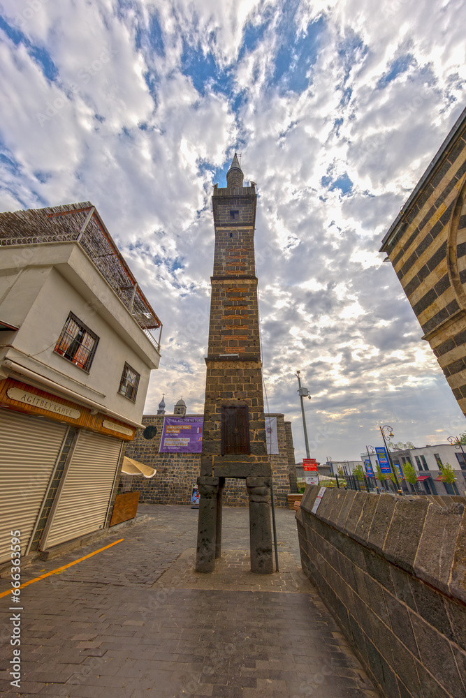 Sur, Diyarbakir, Turkey- October 09 2023: Closeup view of unique minaret based on four columns, dubbed the four-legged Minaret in Diyarbakir