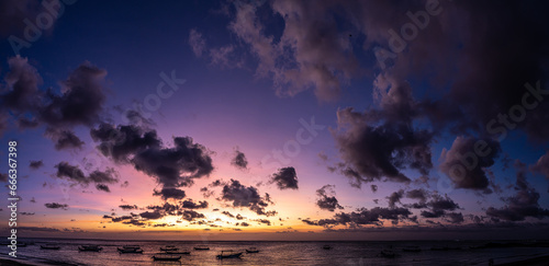 purple sunset at the beach of Bali Indonesia