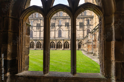 looking through windows at the cloisters at Durham Cathedral, Durham, UK photo