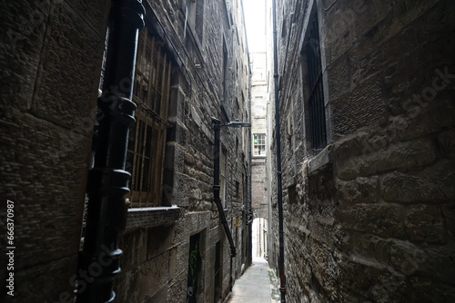 narrow side street along the Royal Mile, Edinburgh, Scotland photo
