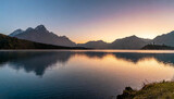 First Light Magic Sunrise at the Lake with Mountains