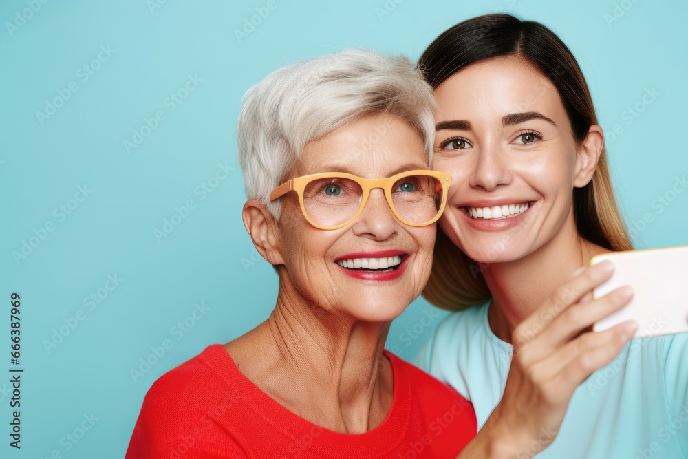 Woman is seen taking picture of another woman using her cell phone. This image can be used to depict modern technology and social interaction. Woman is seen taking picture of another woman using her cell phone. This image can be used to depict modern technology and social interaction.