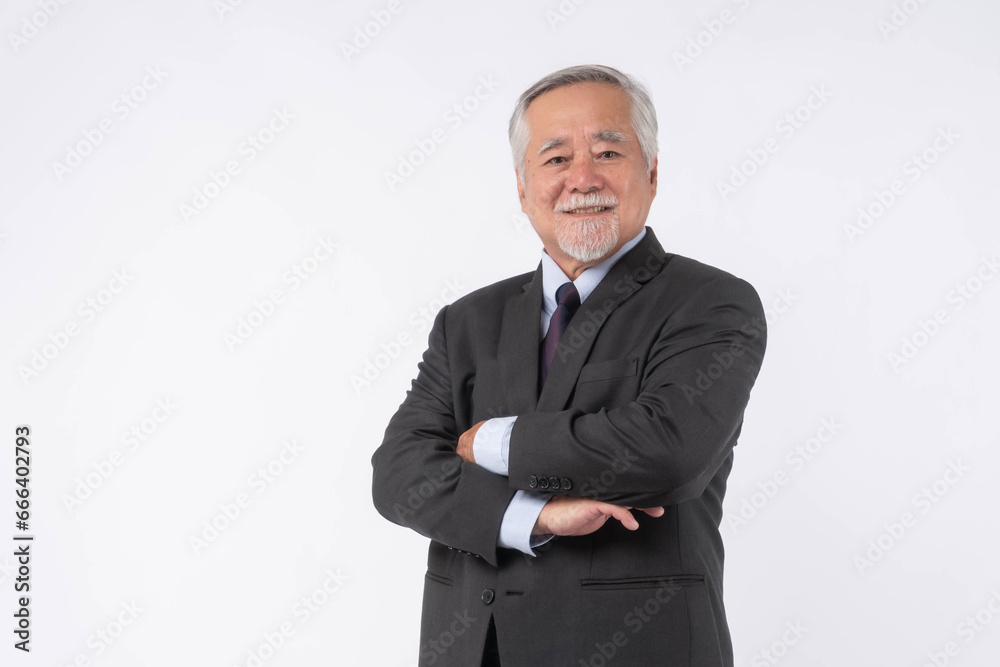portrait of a senior business man with suit , Asian senior man , old man , feel happy good health standing arms crossed isolated on white background - lifestyle senior male concept portrait of a senior business man with suit , Asian senior man , old man , feel happy good health standing arms crossed isolated on white background - lifestyle senior male concept