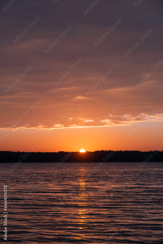 Sunrise over the surface of a forest lake. Sunrise over the surface of a forest lake.