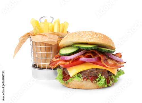 Tasty burger with bacon, vegetables and patty served with french fries isolated on white