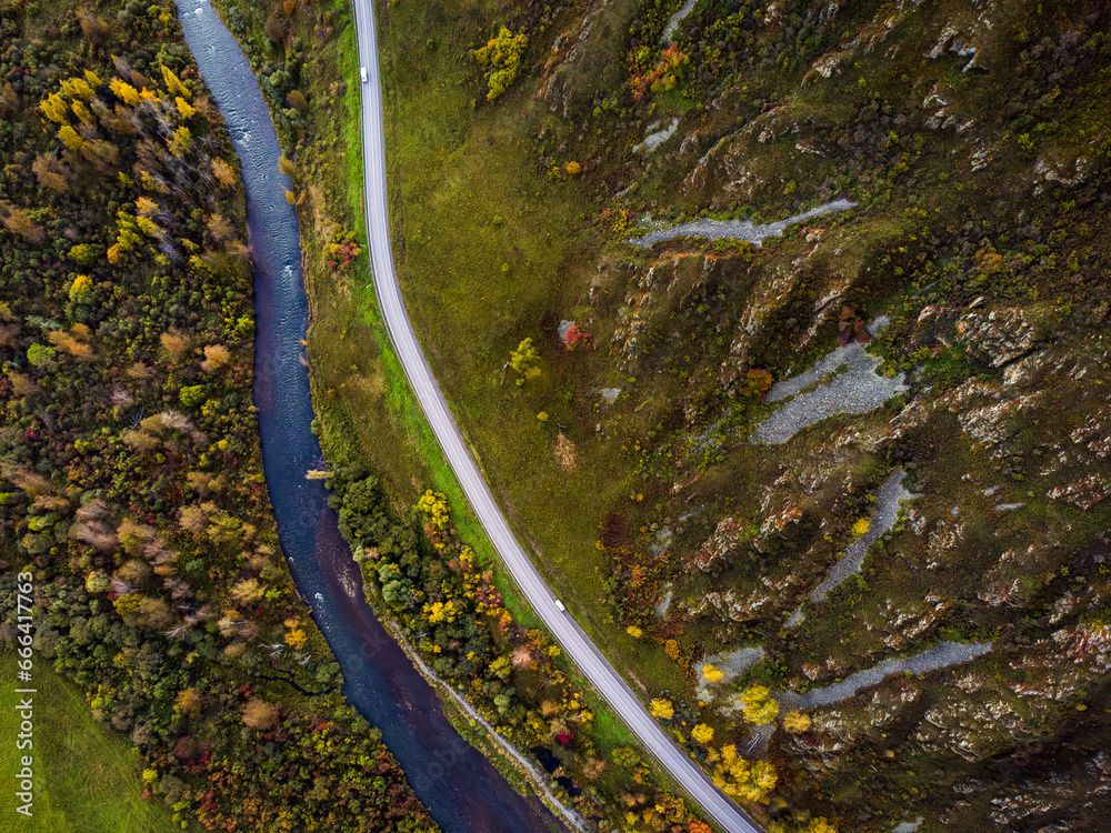Directly above shot of stream and road passing through Altai mountains, Siberia, Russia Directly above shot of stream and road passing through Altai mountains, Siberia, Russia