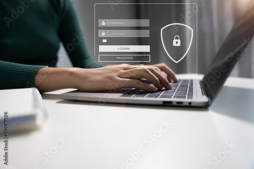 Businessman typing login and password in the concept of cyber security, information security, data protection, and encryption for secure access to user's personal information.