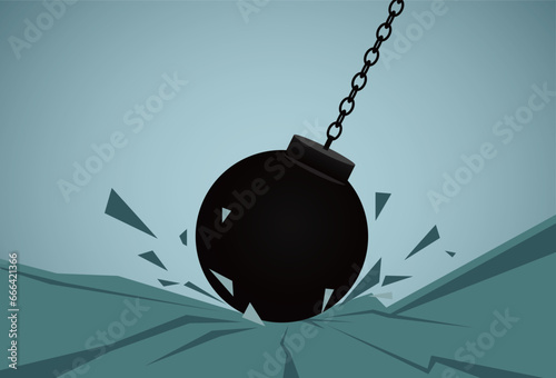 Wrecking ball destroys ground.Destruction effect. Abstract cloud of pieces and fragments after ground demolition by wrecking ball.