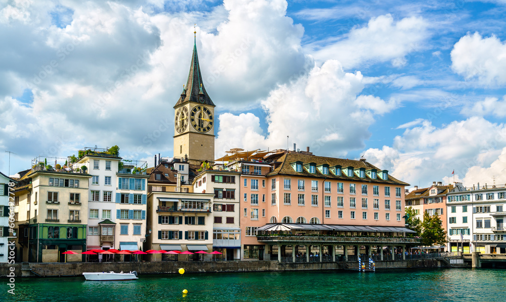 Zurich with St. Peter Church at the Limmat River in Switzerland