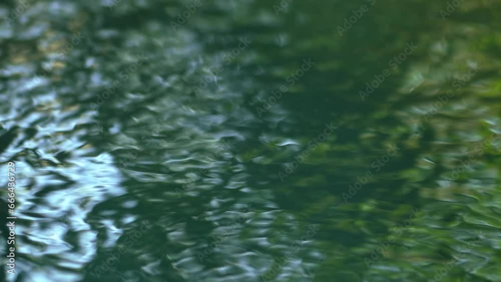 Blue water waves surface close up in swimming pool, background with copy space. Blue water waves surface close up in swimming pool, background with copy space.