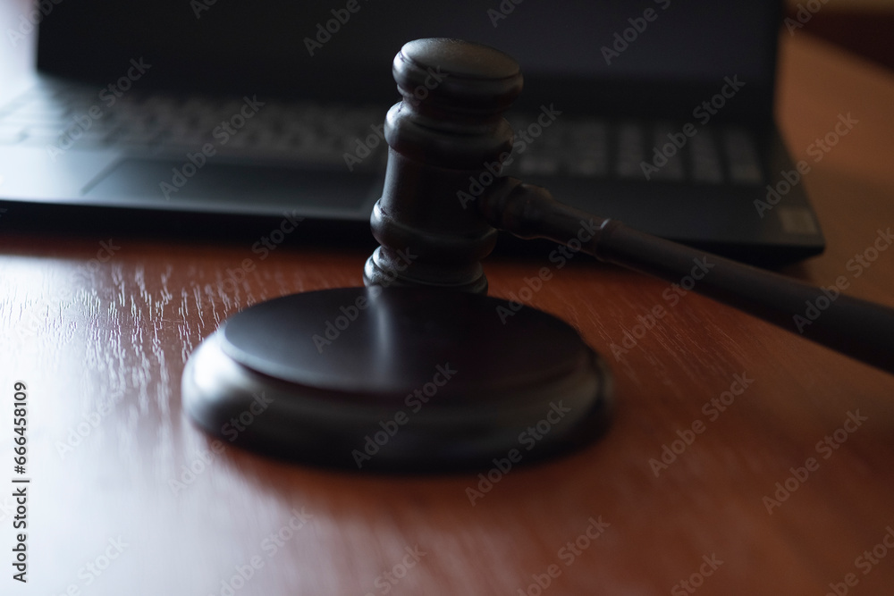 judge's gavel and computer. cyber crimes. the court restricts activities on the Internet. judge's gavel and computer. cyber crimes. the court restricts activities on the Internet.