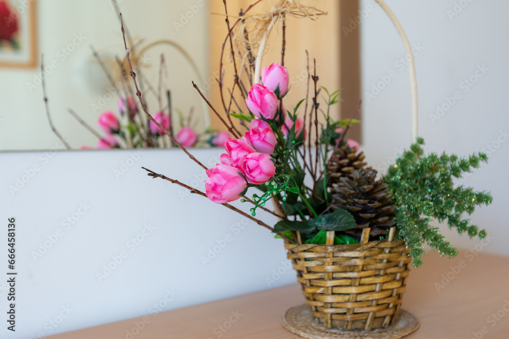 Pink rose flowers on wooden table close-up