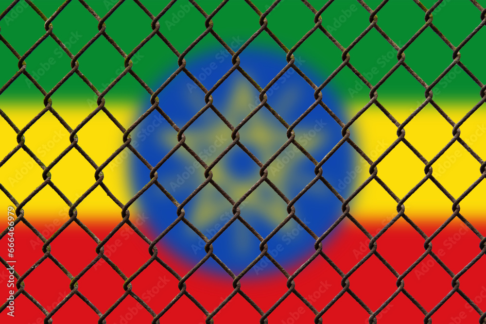A steel mesh against the background of the flag Ethiopia. A steel mesh against the background of the flag Ethiopia.