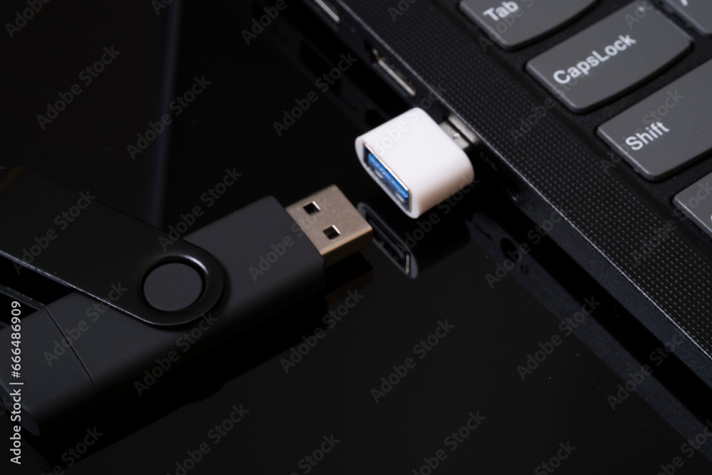 flashcard and laptop. data transmission. solid state drive. flashcard and laptop. data transmission. solid state drive.