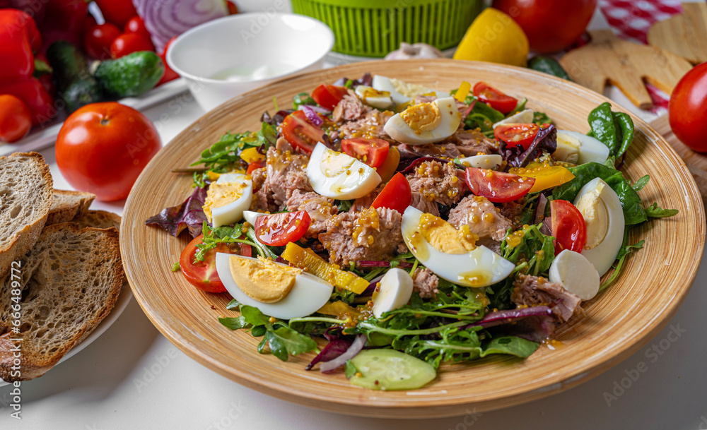 Appetizing fresh salad with canned tuna and vegetables. Appetizing fresh salad with canned tuna and vegetables.