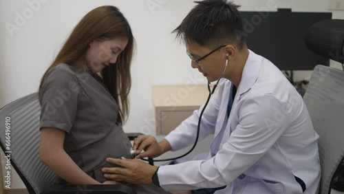 Pregnant woman visit doctor for medical examination. Health care concept. photo
