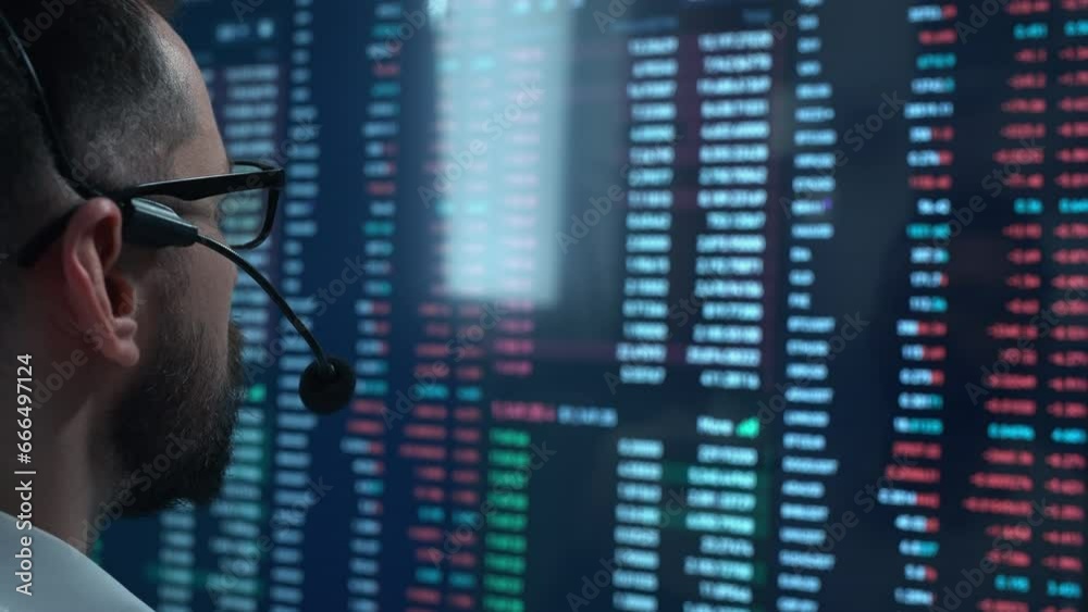 Trader is working with computer. Screen with stock charts and data analysis. Broker trading online. Concept of bitcoin BTC and stock market or crypto trading Trader is working with computer. Screen with stock charts and data analysis. Broker trading online. Concept of bitcoin BTC and stock market or crypto trading